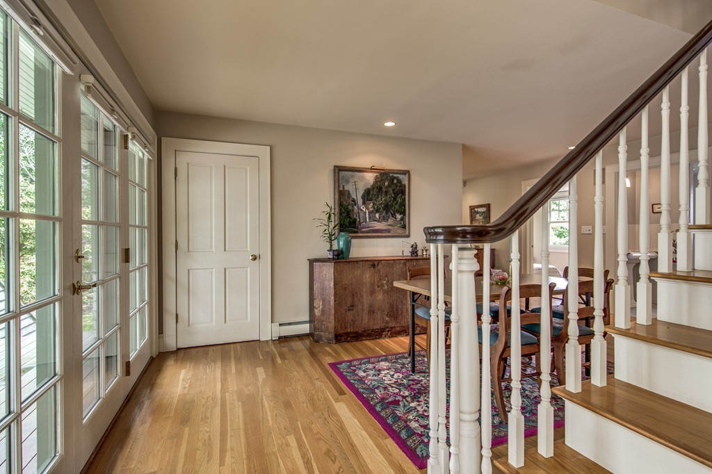 86 Eastern Point Boulevard Gloucester, MA 01930 - Photo 10 of 30 a view of a hallway with wooden floor and staircase