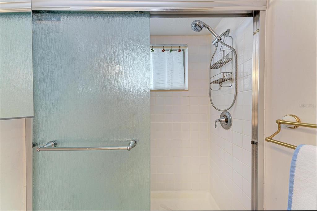 5938 Welcome Road, Unit H22 Bradenton, FL 34207 - Photo 24 of 38 a bathroom with a shower