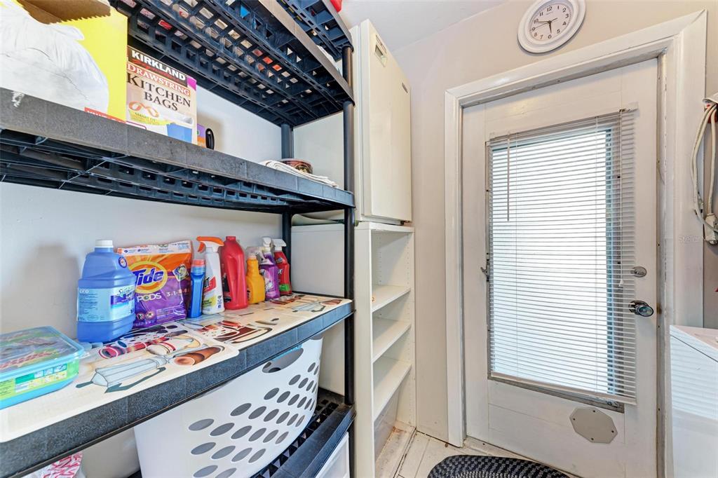 5938 Welcome Road, Unit H22 Bradenton, FL 34207 - Photo 26 of 38 a view of an entryway with a bed