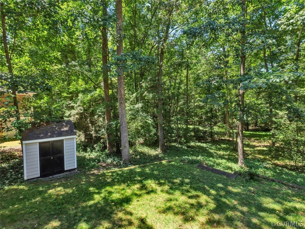 6302 West Branch Road Midlothian, VA 23112 - Photo 35 of 38 View of backyard shed.