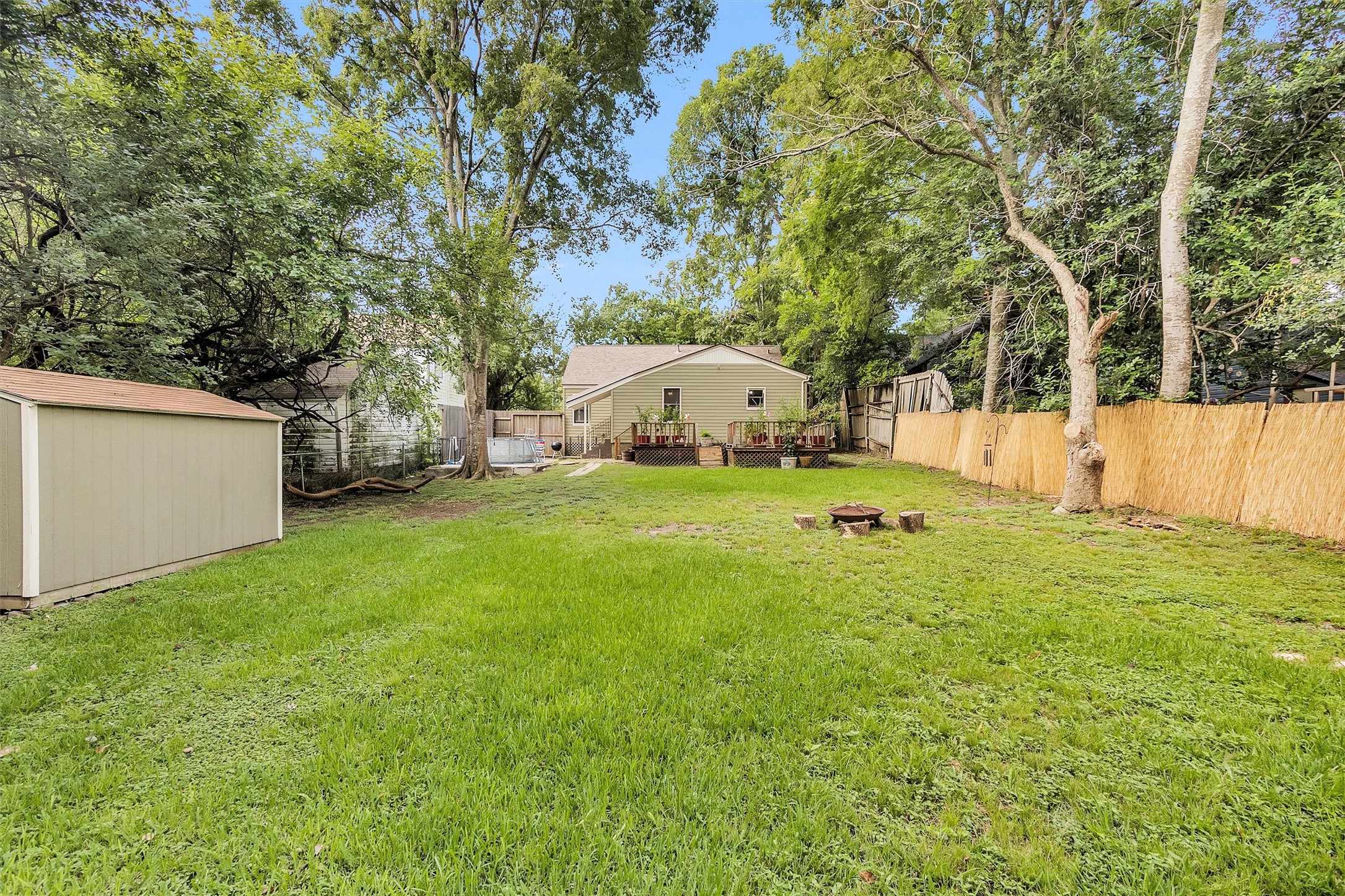 1720 18th Street Huntsville, TX 77340 - Photo 34 of 37 a view of a house with a backyard