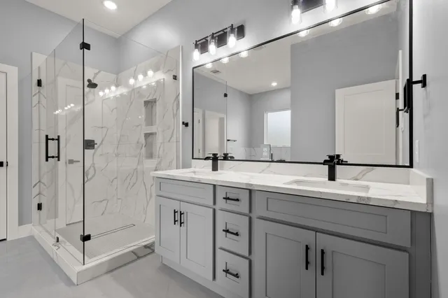 a white bath tub sitting in a bathroom