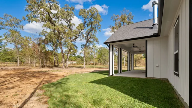 a view of a back yard of the house