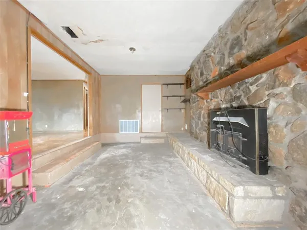 a view of a hallway with a stove