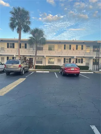 a cars parked in front of a building