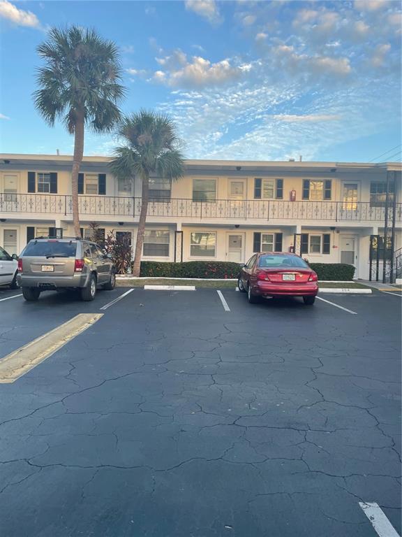 a cars parked in front of a building