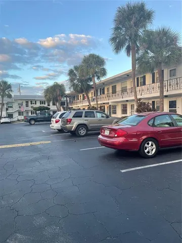 a cars parked in front of a building