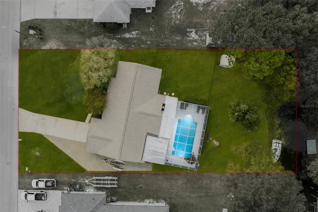 an aerial view of a house having yard