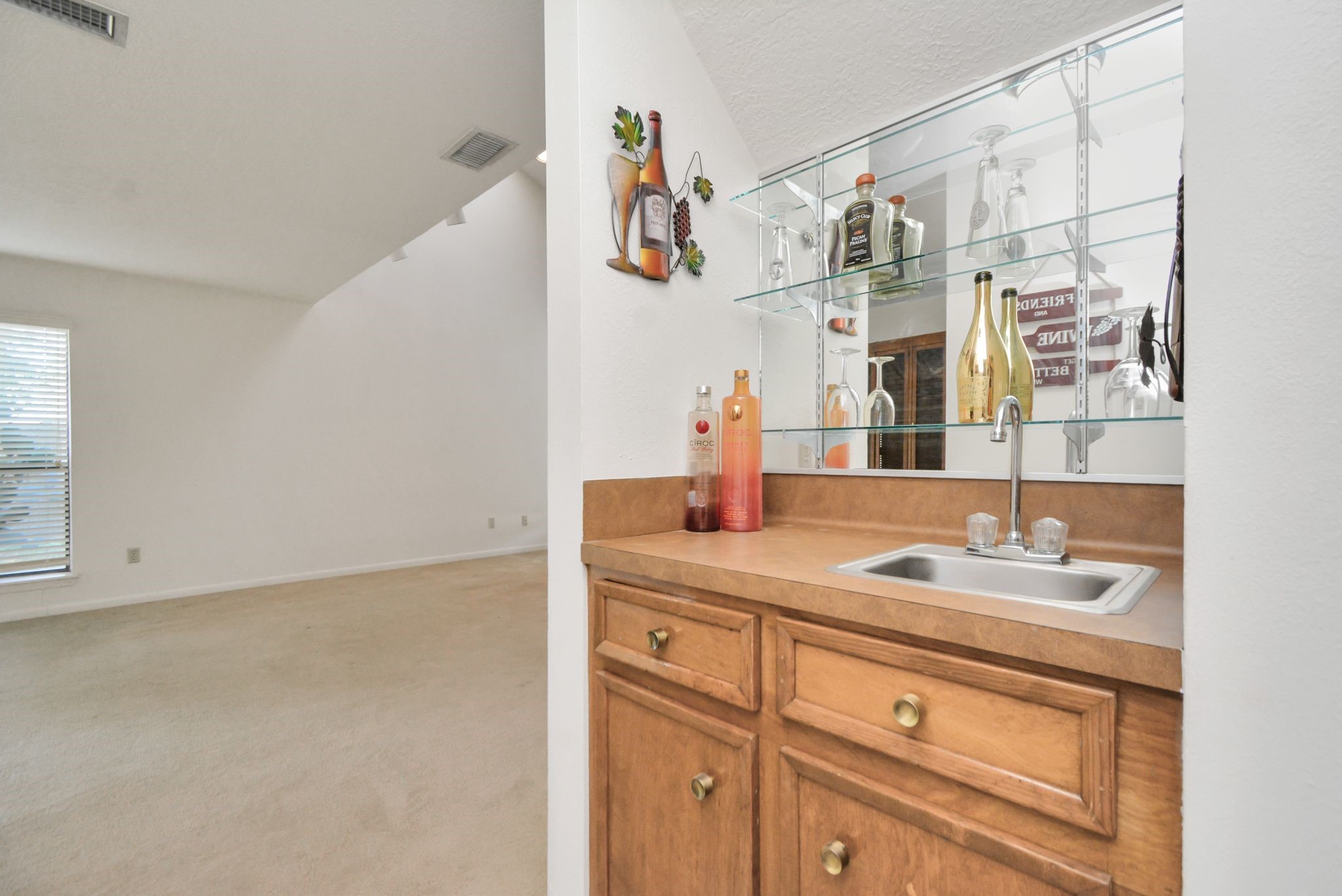 4743 Sabrina Drive Houston, TX 77066 - Photo 13 of 22 a bathroom with a sink and a mirror
