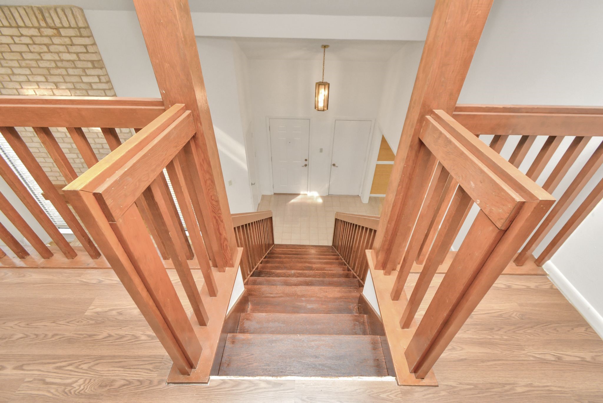 4743 Sabrina Drive Houston, TX 77066 - Photo 14 of 22 a view of staircase with white walls and a window