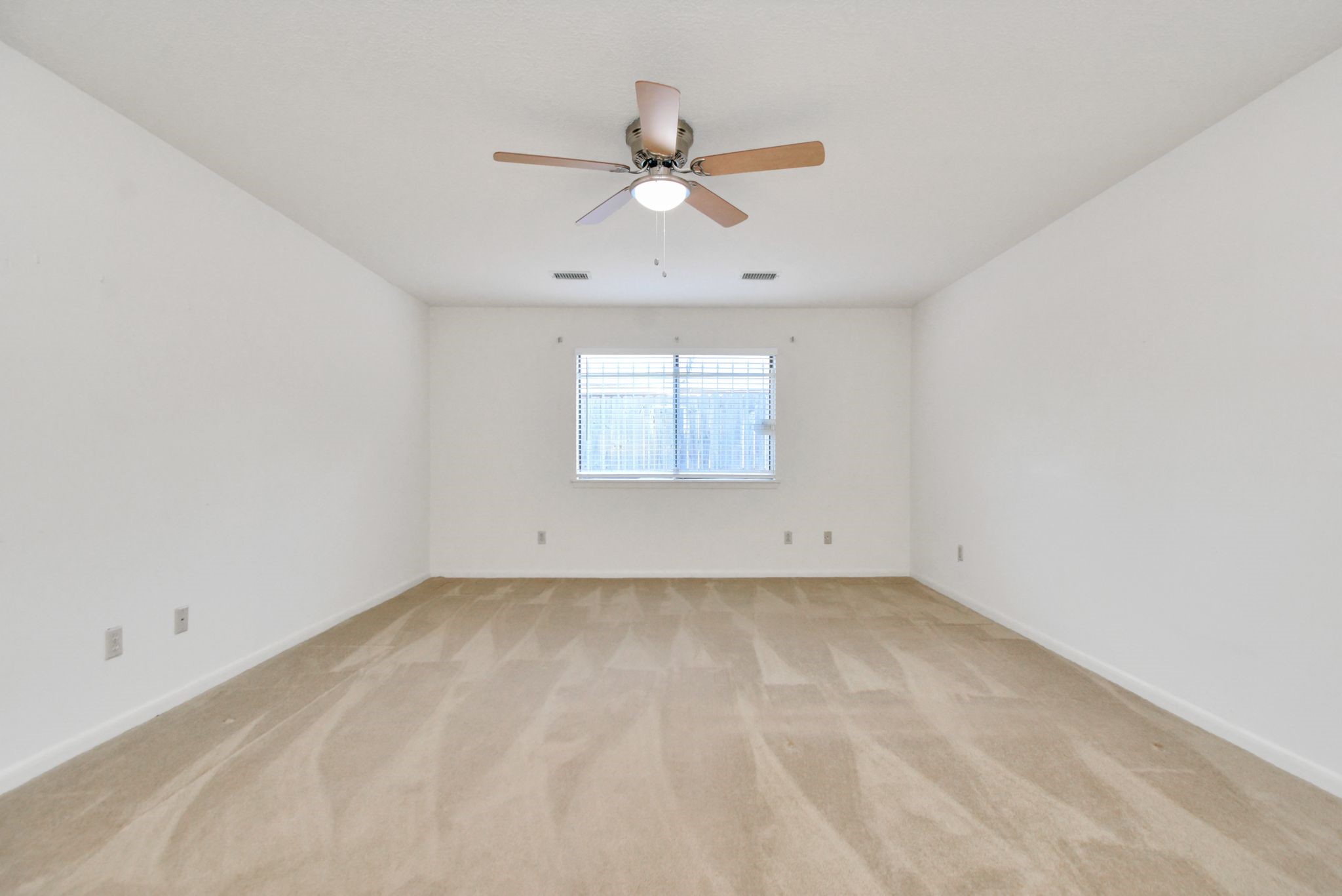 4743 Sabrina Drive Houston, TX 77066 - Photo 8 of 22 wooden floor in an empty room with a window