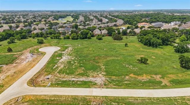 a view of a yard with an outdoor seating