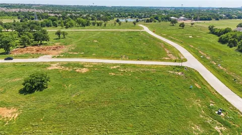 a view of a lake with a big yard