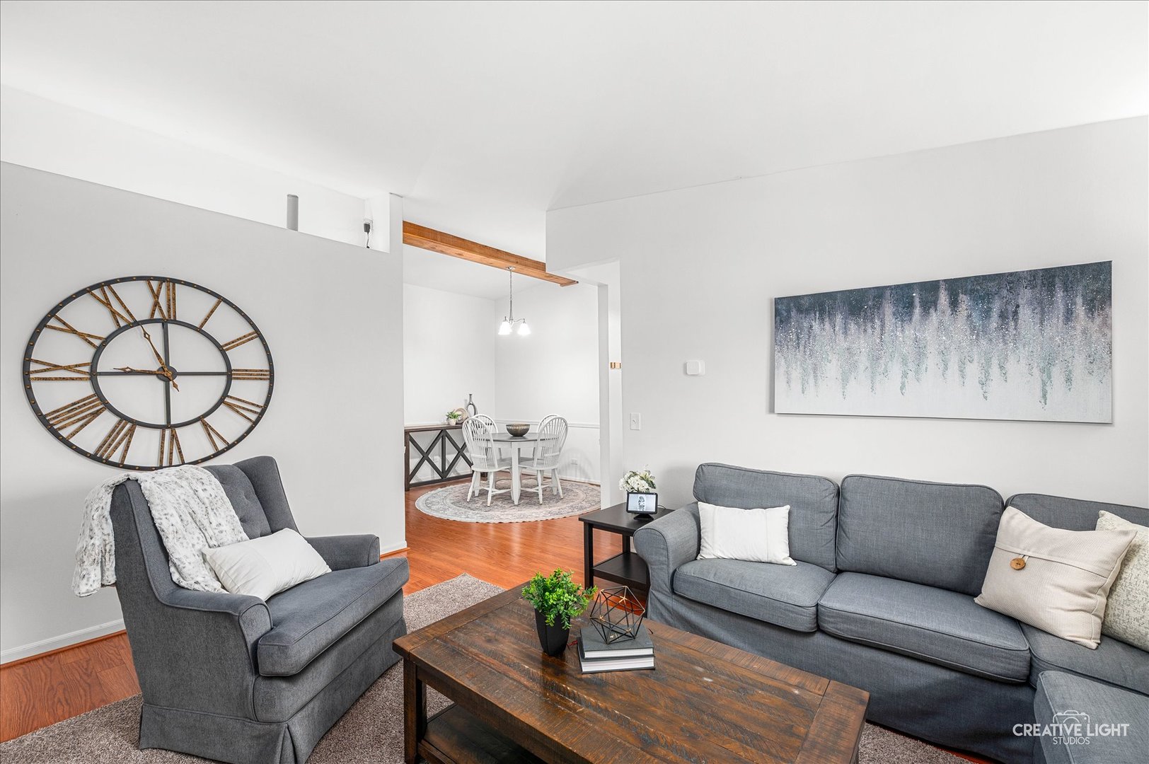 40 Harbor Court, Unit 304 Naperville, IL 60565 - Photo 3 of 18 a living room with furniture and a large mirror