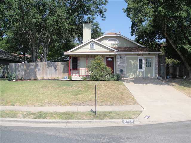 8512 Croydon Loop Austin, TX 78748 - Photo 1 of 1 a front view of a house with a garden