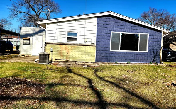 a view of a house with a patio