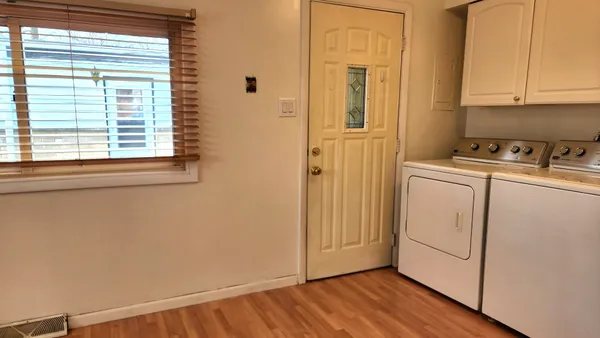 a view of a utility room with washer and dryer