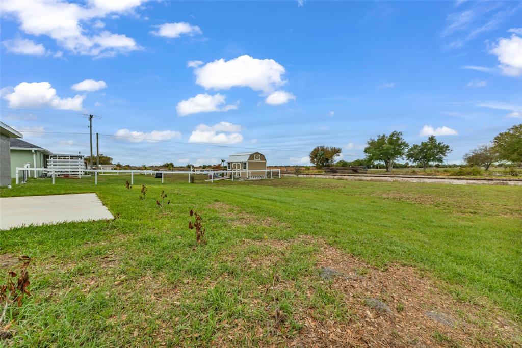 11615 Southwest Orange Avenue Arcadia, FL 34269 - Photo 26 of 27 a view of a golf course with a lake