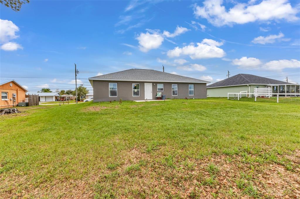 11615 Southwest Orange Avenue Arcadia, FL 34269 - Photo 27 of 27 a view of a house with a yard