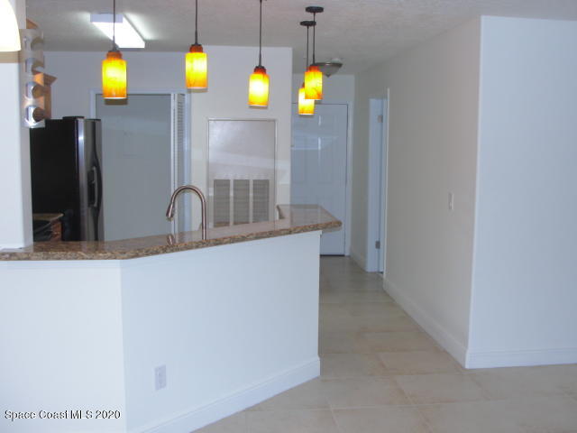 7667 North Wickham Road, Unit 1504 Melbourne, FL 32940 - Photo 15 of 27 Washer/Dryer off the kitchen