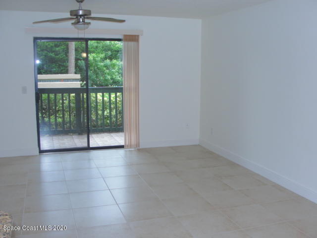 7667 North Wickham Road, Unit 1504 Melbourne, FL 32940 - Photo 16 of 27 Living room/patio