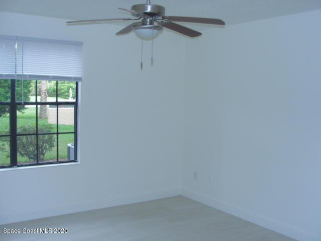 7667 North Wickham Road, Unit 1504 Melbourne, FL 32940 - Photo 18 of 27 Spacious Bedroom