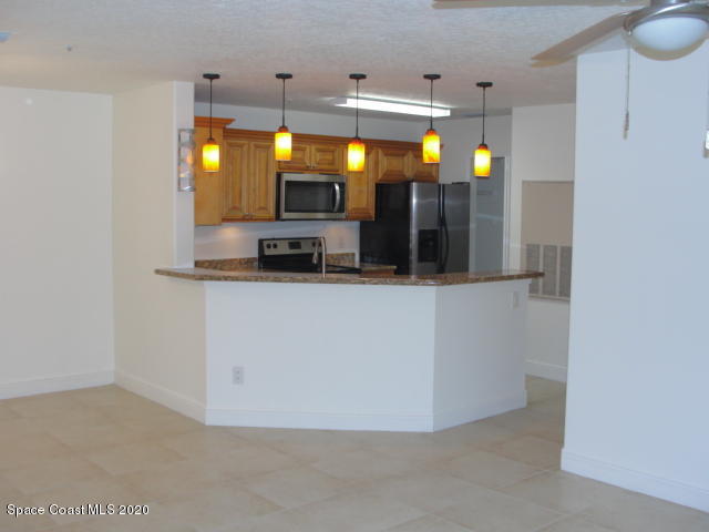 7667 North Wickham Road, Unit 1504 Melbourne, FL 32940 - Photo 10 of 27 Breakfast bar