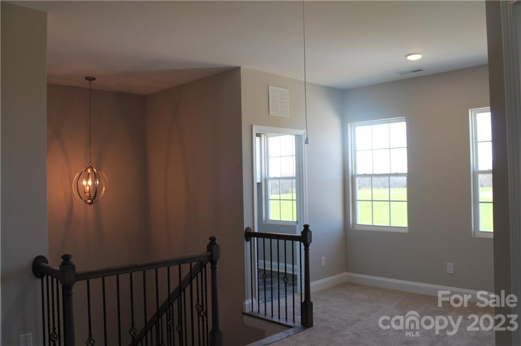 3220 Austin Chaney Road Monroe, NC 28110 - Photo 12 of 18 a view of a room with windows