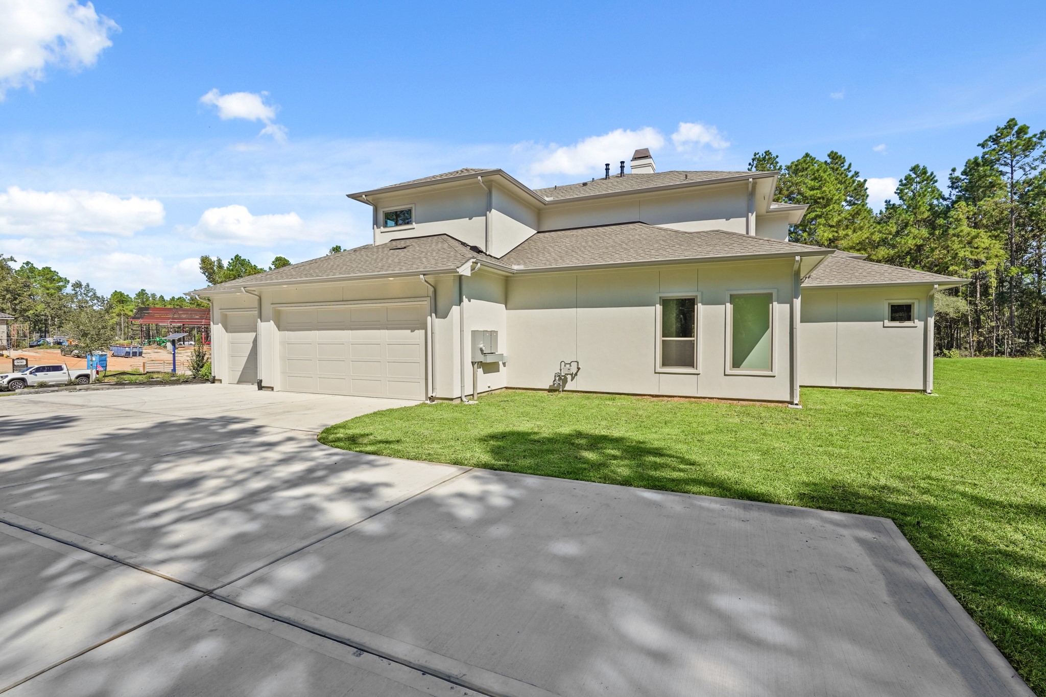 24919 Balmorhea Way Montgomery, TX 77316 - Photo 36 of 36 a view of a house with a yard and a garage