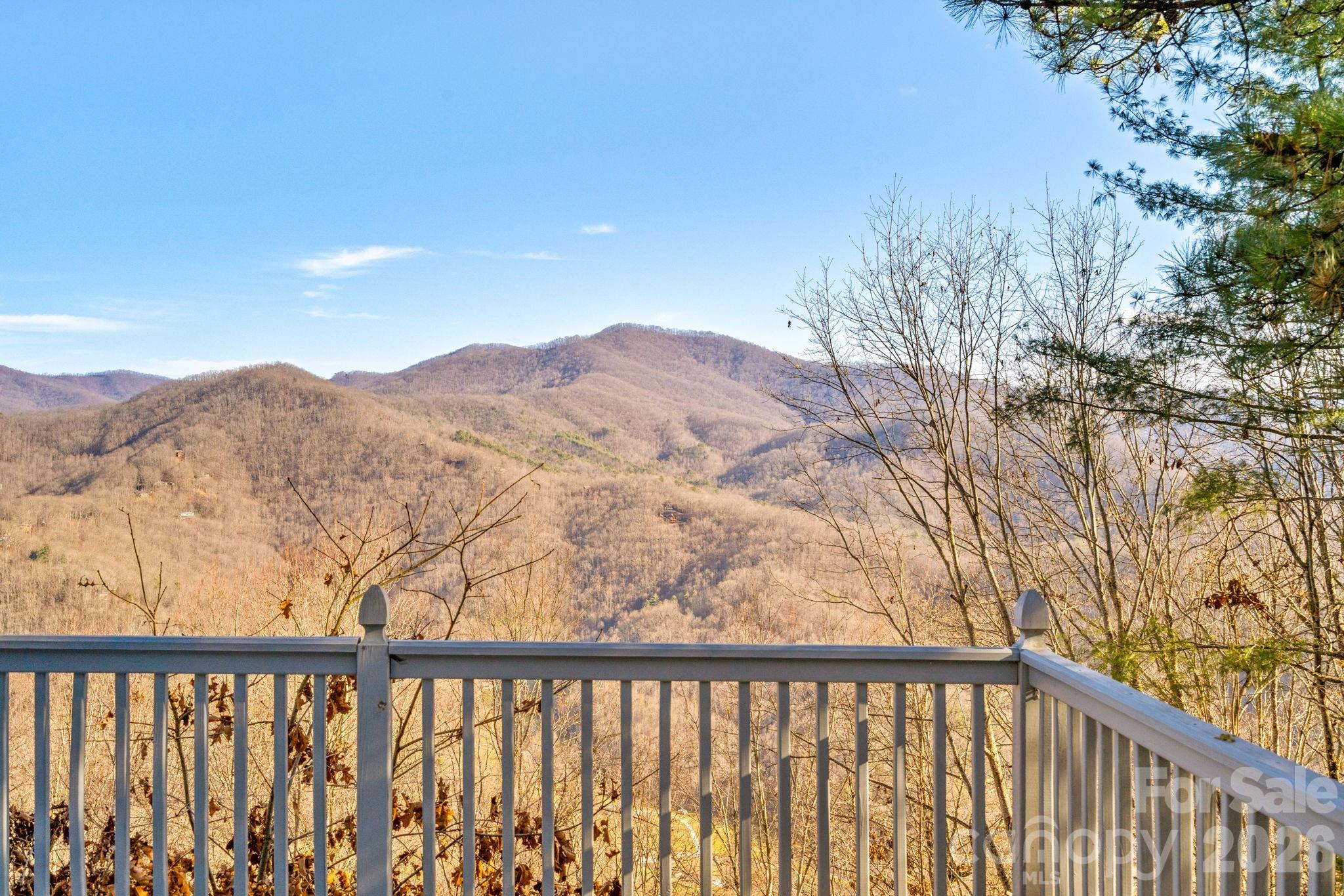 889 Big Ridge Road Franklin, NC 28734 - Photo 23 of 32 a view of a mountain from a balcony