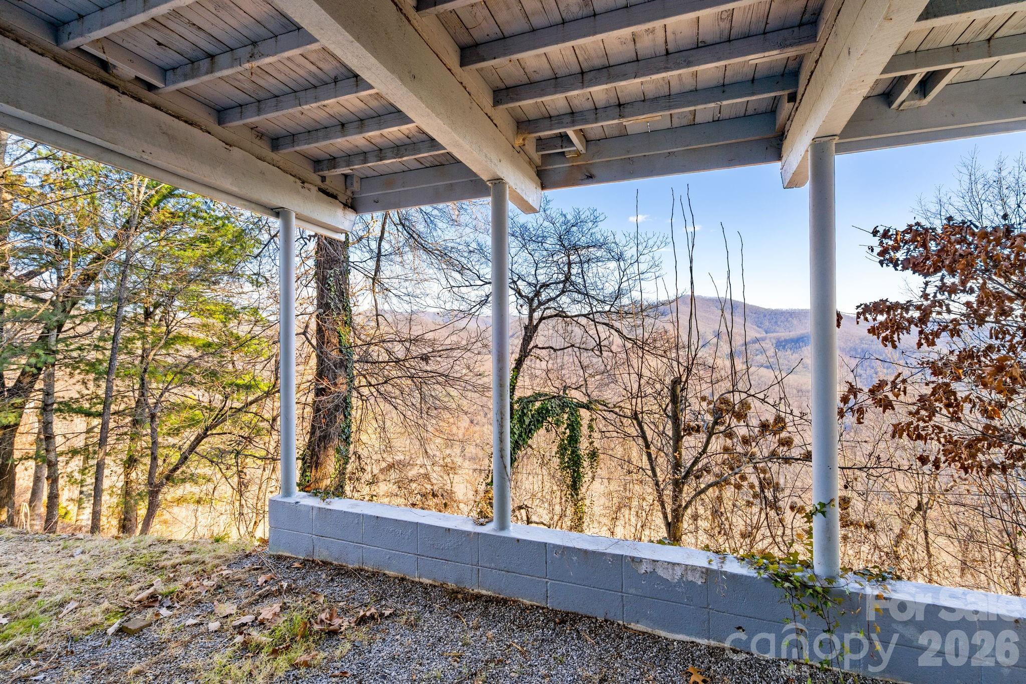 889 Big Ridge Road Franklin, NC 28734 - Photo 24 of 32 a view of backyard with wooden fence