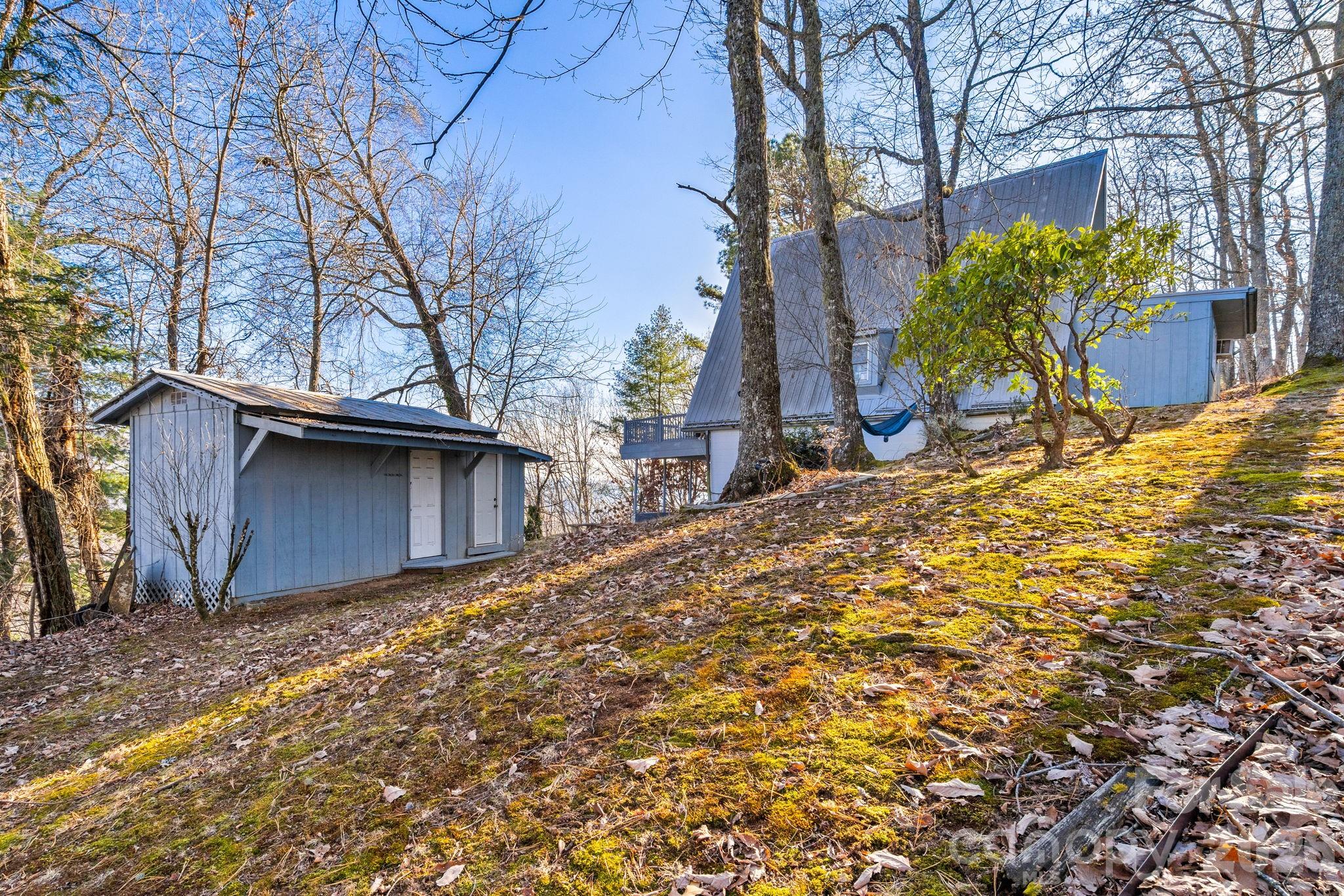 889 Big Ridge Road Franklin, NC 28734 - Photo 25 of 32 a view of a covered with snow in the yard