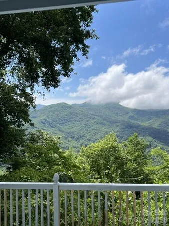 a view of a two chair in the balcony