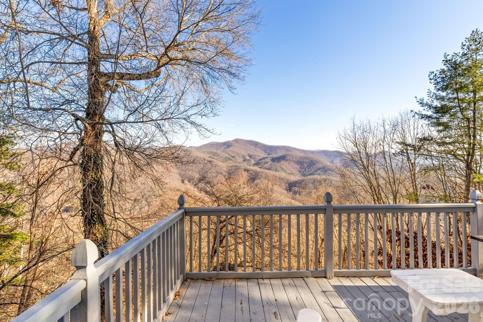 889 Big Ridge Road Franklin, NC 28734 - Photo 31 of 32 a balcony with wooden floor and fence