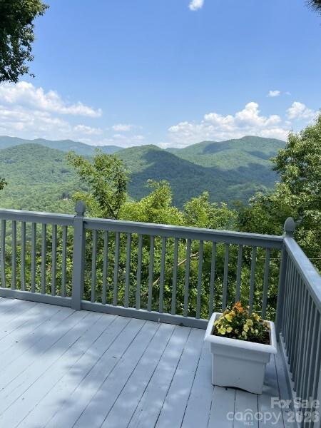 889 Big Ridge Road Franklin, NC 28734 - Photo 4 of 32 a view of a two chair in the balcony