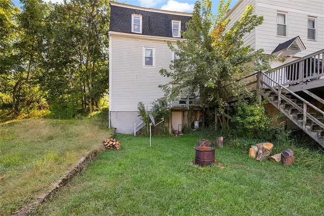 a house view with a garden space