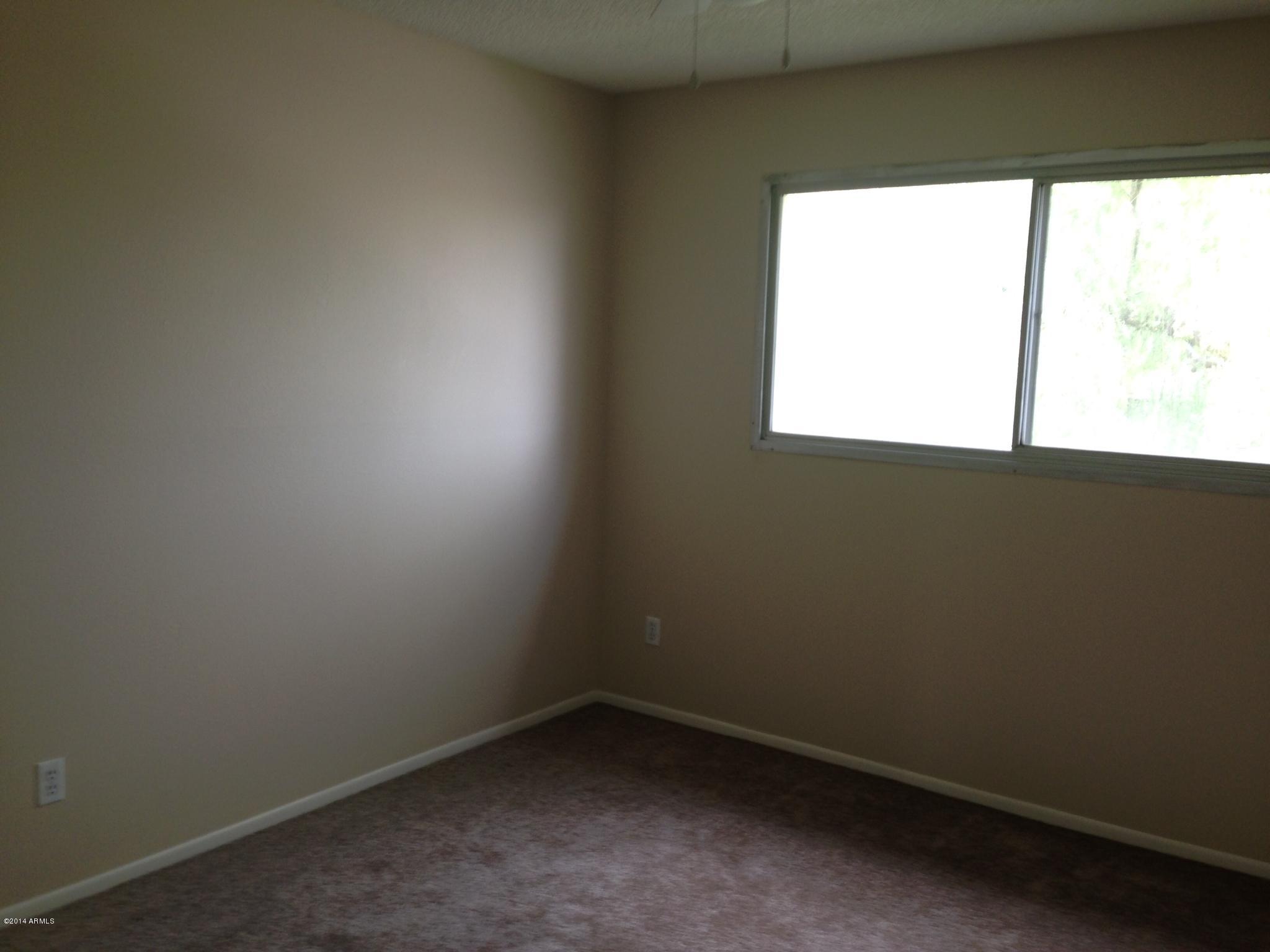 6829 East Osborn Road, Unit B Scottsdale, AZ 85251 - Photo 15 of 20 a small space with a window