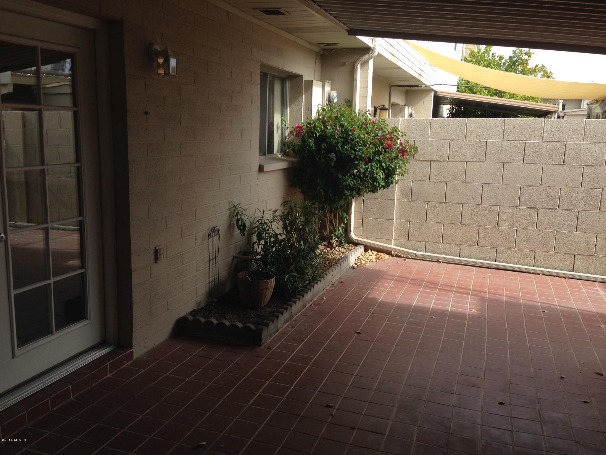 6829 East Osborn Road, Unit B Scottsdale, AZ 85251 - Photo 19 of 20 a view of a entryway door of the house