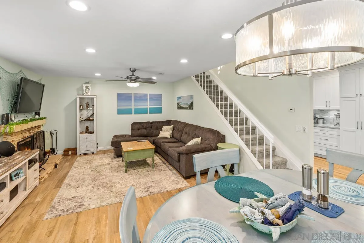 13350 Birch Tree Lane Poway, CA 92064 - Photo 12 of 43 a living room with furniture and a flat screen tv