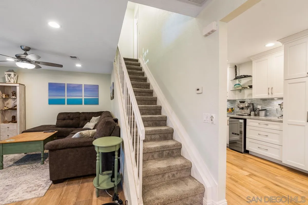 13350 Birch Tree Lane Poway, CA 92064 - Photo 19 of 43 a living room with furniture and a fireplace