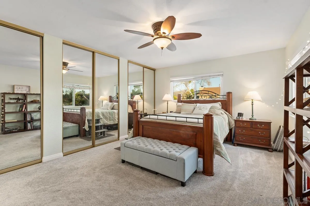 13350 Birch Tree Lane Poway, CA 92064 - Photo 20 of 43 a bedroom with furniture and a ceiling fan