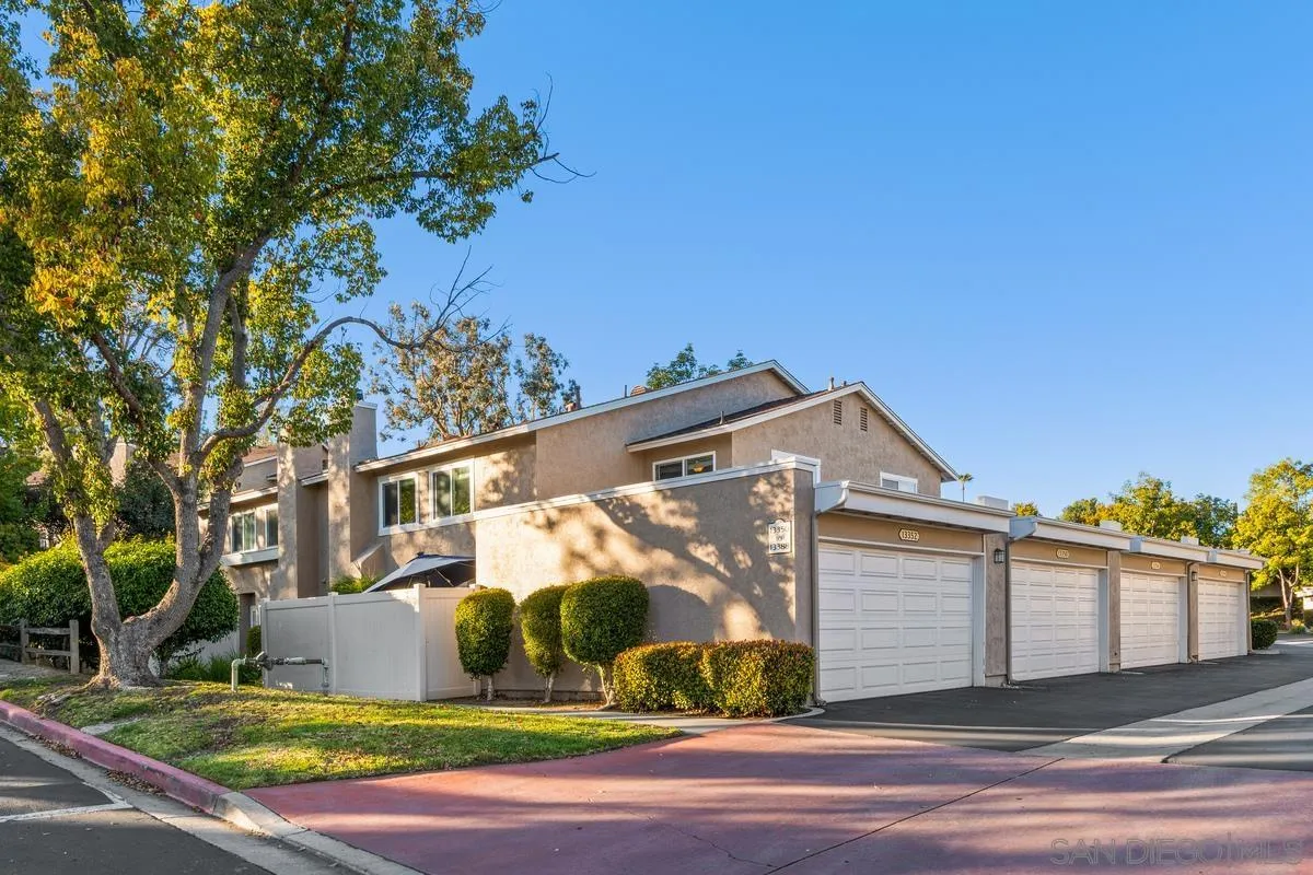 13350 Birch Tree Lane Poway, CA 92064 - Photo 2 of 43 a front view of a house with garden