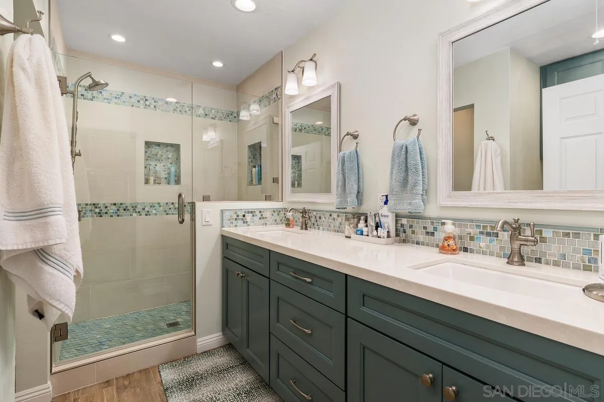 13350 Birch Tree Lane Poway, CA 92064 - Photo 22 of 43 a bathroom with a double vanity sink mirror and double
