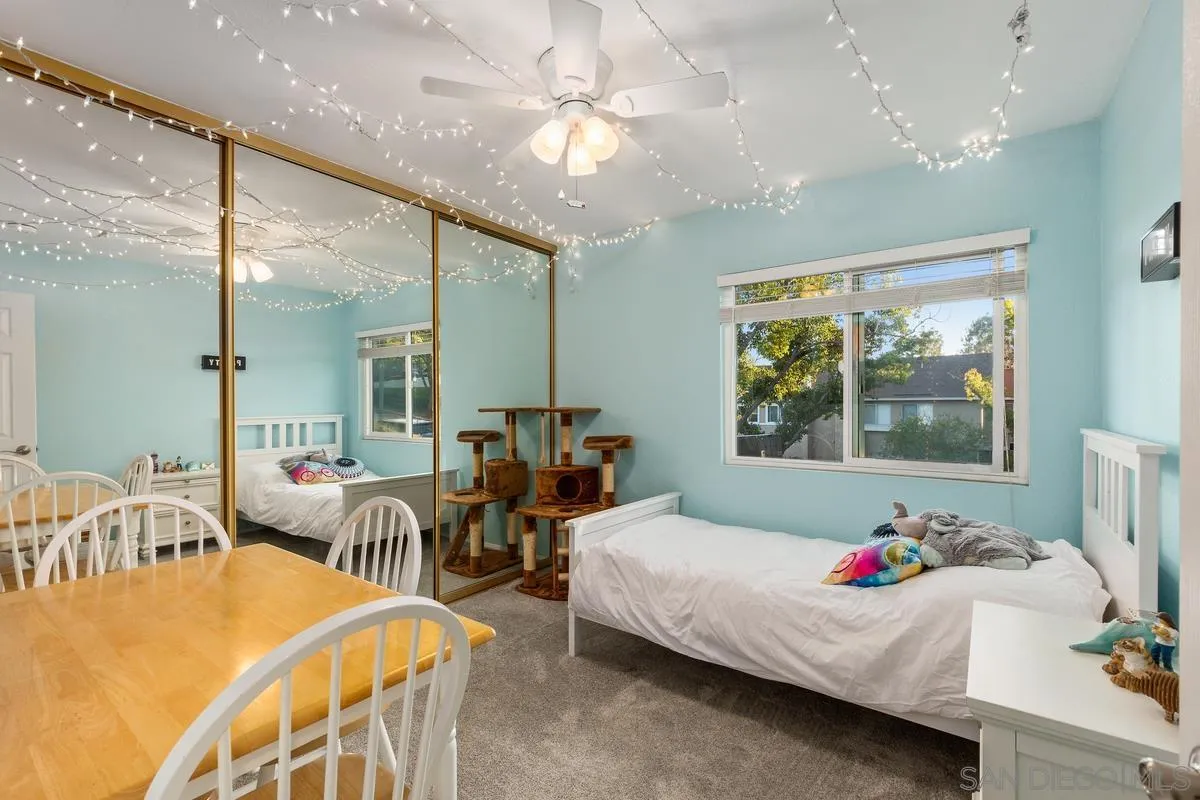 13350 Birch Tree Lane Poway, CA 92064 - Photo 24 of 43 a bedroom with furniture and a large window