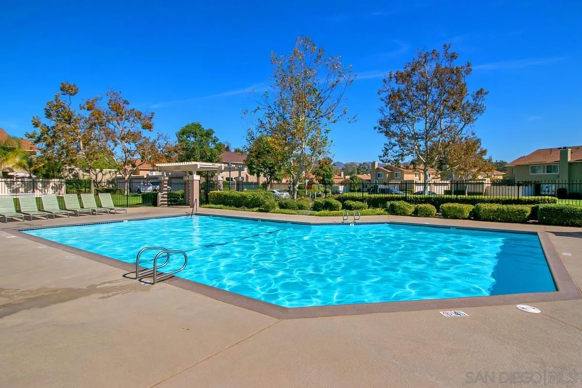 13350 Birch Tree Lane Poway, CA 92064 - Photo 30 of 43 a view of a swimming pool with a yard