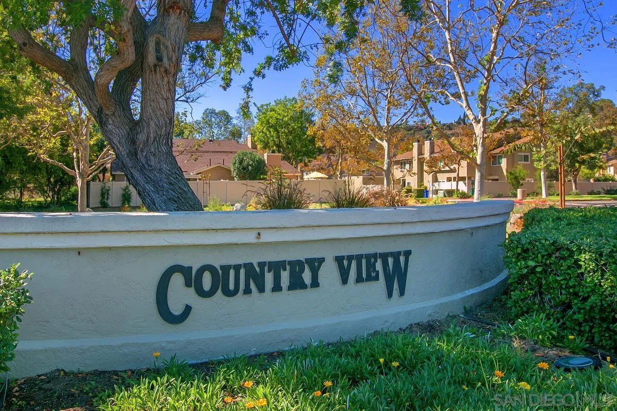 13350 Birch Tree Lane Poway, CA 92064 - Photo 34 of 43 a sign that is sitting on a brick wall