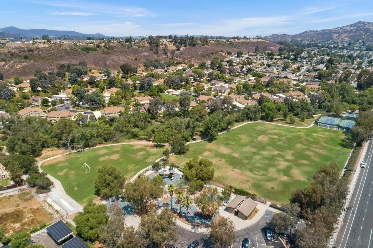 13350 Birch Tree Lane Poway, CA 92064 - Photo 36 of 43 an aerial view of residential houses with outdoor space and trees