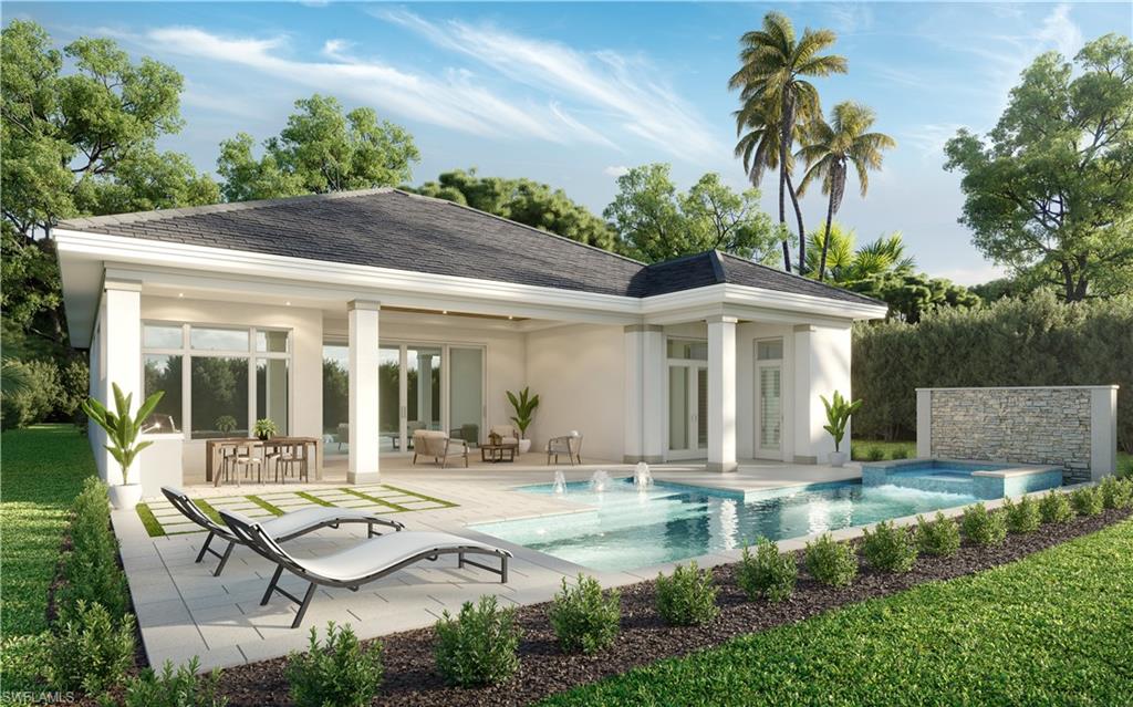 6717 Newport Road Naples, FL 34109 - Photo 2 of 4 a view of a patio with table and chairs potted plants and palm tree