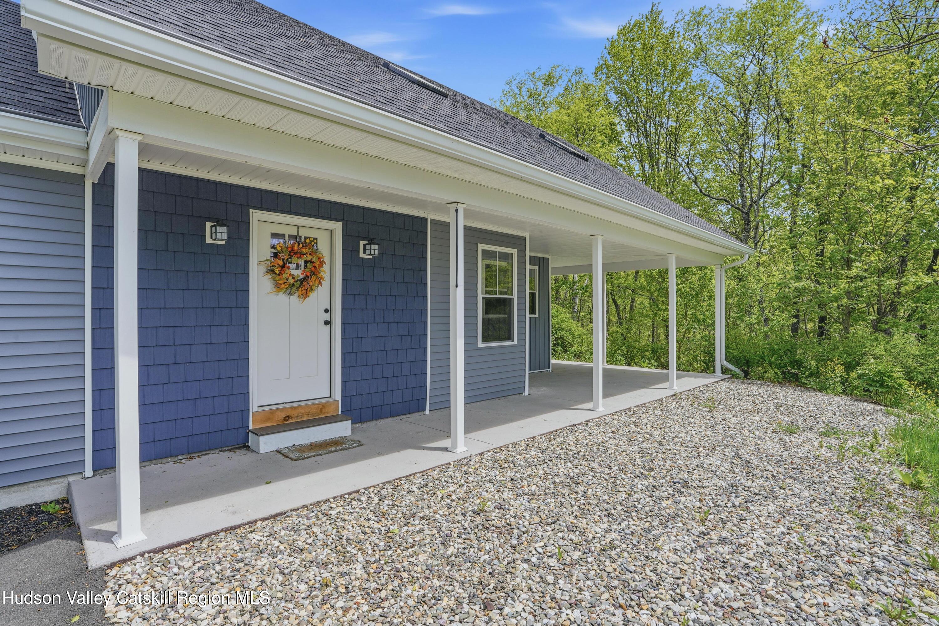 757 Taborton Road Sand Lake, NY 12153 - Photo 25 of 32 a view of backyard with large windows