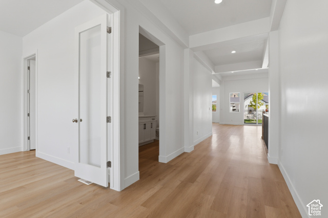 538 North Legend Circle, Unit 505 Mapleton, UT 84664 - Photo 8 of 48 Light wood-finish flooring, white walls, recessed lighting, and a white vanity with a rectangular sink